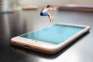 man jumping phone